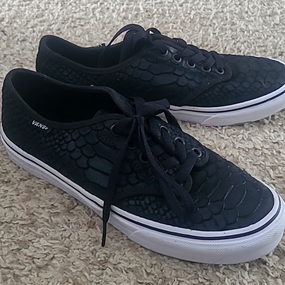 Vans , women's size 7 1/2 , black snake skin pattern shoes